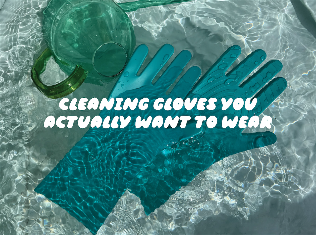 Blue cleaning gloves floating in a pool of water with text overlay that says "cleaning gloves you actually want to wear"